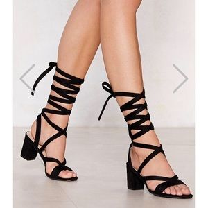 Lace up sandals in black suede